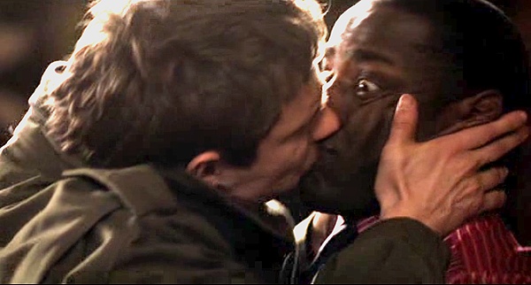 two men who are kissing each other