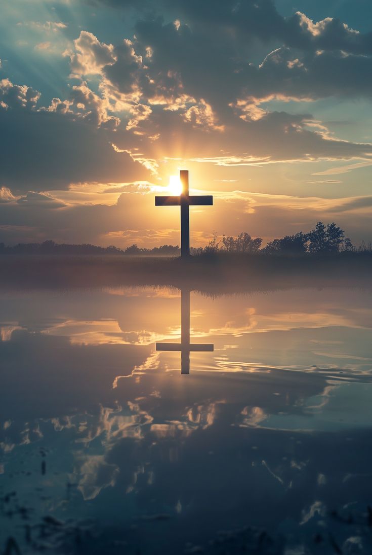 a cross is shown in the middle of a lake with clouds and sun behind it