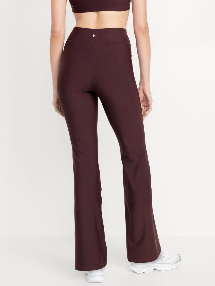 hidden front pocket go-dry wicks moisture extra high waist is 1" higher than standard high rise sits above belly button fitted hip and thigh hits below ankle 31 1/2" regular inseam 29 1/2" petite inseam 35 1/2" tall inseam models are approx.  5'9" and wear sizes s (4), l (12), and xl (18)machine wash according to the care instruction label Flare Leggings, Petite Size, Wicks, Belly Button, Toddler Boys, Front Pocket, Old Navy, High Waist, High Rise