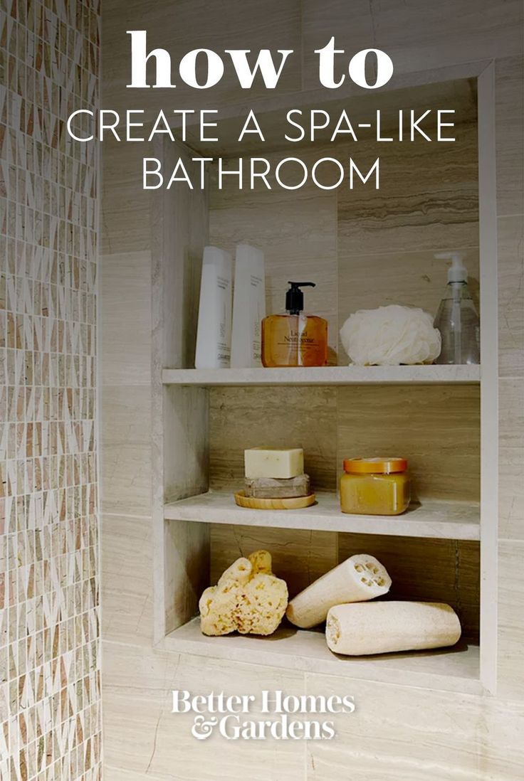 a bathroom shelf with towels, soaps and other items on it's shelves