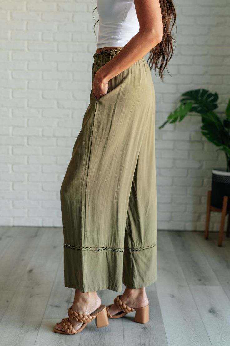 Embark on a stylish journey with our Exciting Escapade Wide Leg Pants, crafted to blend comfort with playful style. Made from woven fabric, these pants offer a lightweight and breathable feel, perfect for all-day wear. The cased elastic waistline ensures a comfortable fit while the ruffle details and geometric embroidery add charm. Woven Cased Elastic Waistline Ruffled Waistline Decorative Tasseled Drawstring Straight Leg Embroidered Detail Functional Side Pockets 100% Viscose True to Size S: Wa Europe 2024, Everyday Jeans, Ribbed Knit Bodysuit, Double Chain Necklace, Playful Style, Geometric Embroidery, Knit Bodysuit, Boutique Homes, Boutique Fashion