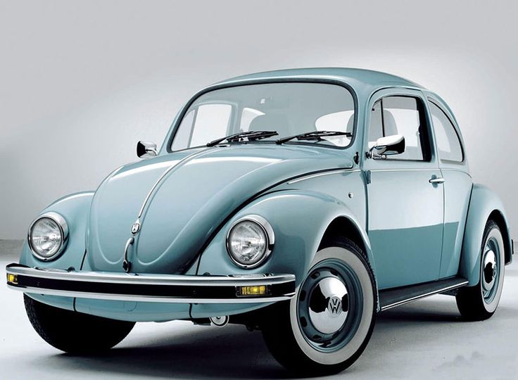 an old blue vw bug is shown in this image