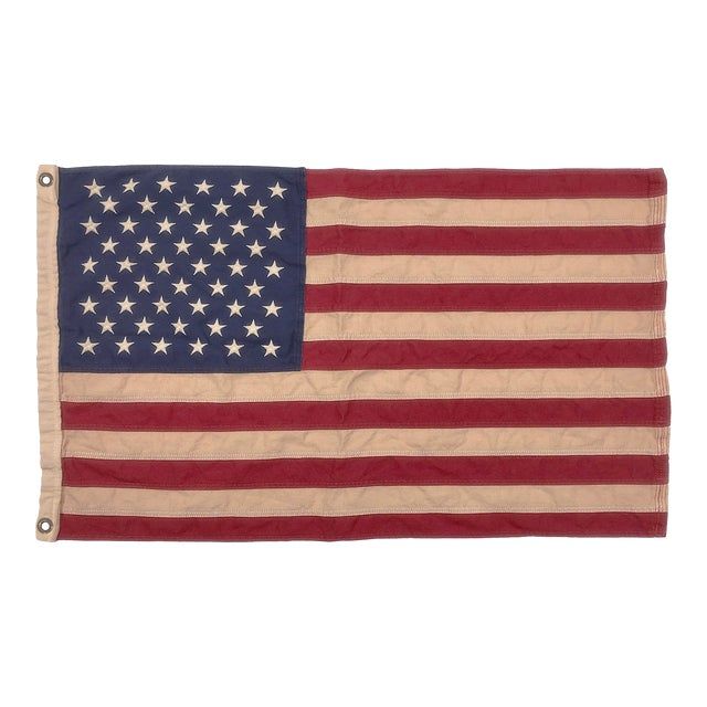 an old american flag is displayed on a white background