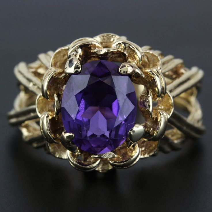 14k Yellow Gold Amethyst Cocktail Ring This Ring Is Made Of 14 Karat Yellow Gold & Features A Large Amethyst Gemstone Placed On An Extremely Detailed Setting. The Band Is A Size 10 & Has "14k" Stamped Onto The Inner Part Of It. Size: 10 (Resizable) Weight: 4.5dwt // 7grams Metal: 14 Karat Yellow Gold Stone: 1 Amethyst Gemstone (10.3mm X 8.1mm) 19040-11 * E-Cdr Purple 14k Gold Jewelry With Accent Stones, Oval Purple Amethyst Ring With 17 Jewels, 14k Gold Purple Amethyst Ring, Hallmarked 14k Gold Purple Amethyst Ring, 14k Gold Hallmarked Purple Amethyst Ring, Formal Purple Amethyst Ring In 14k Gold, Formal 14k Gold Purple Amethyst Ring, Yellow Gold Amethyst Gemstone With Accent Stones, 14k Gold Purple Ring Jewelry