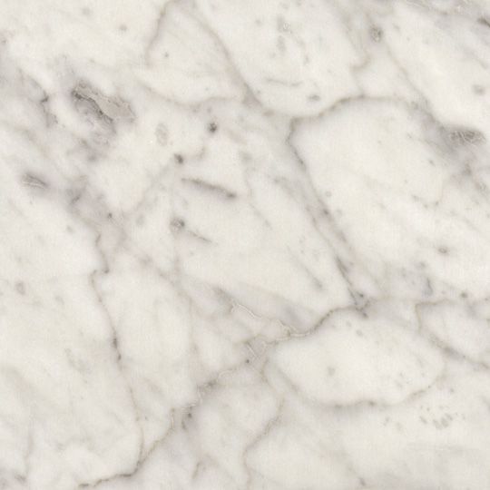 the marble is white and grey with black spots on it's edges, as well as some other things