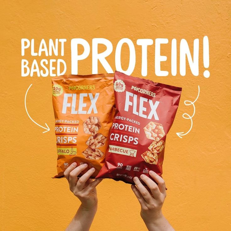 someone holding two bags of plant based proteins in front of a yellow wall with the words plant based protein on it