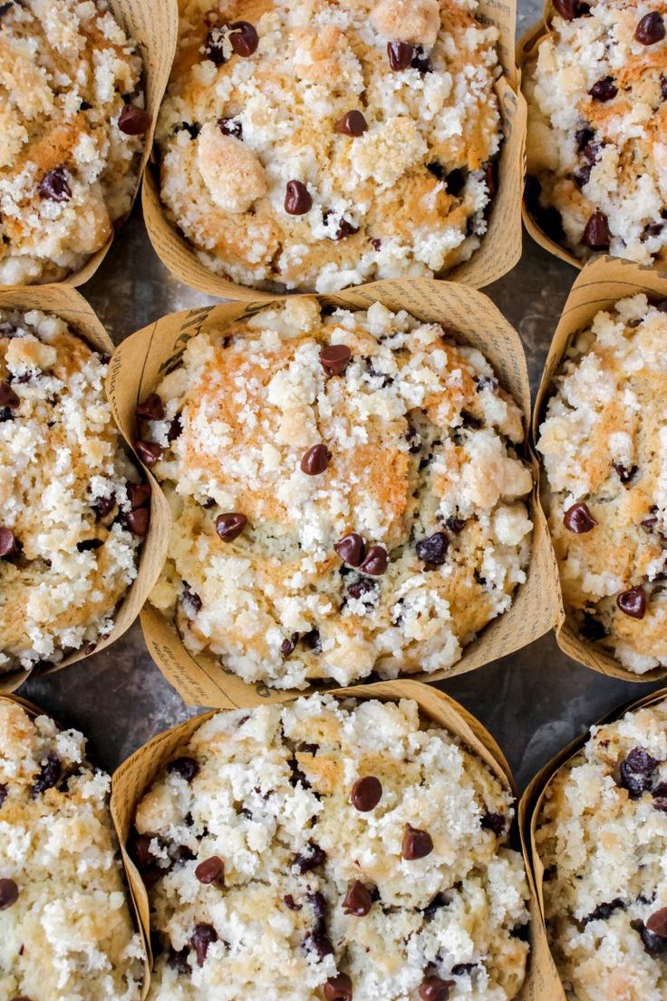 several muffins with chocolate chips and coconut on top