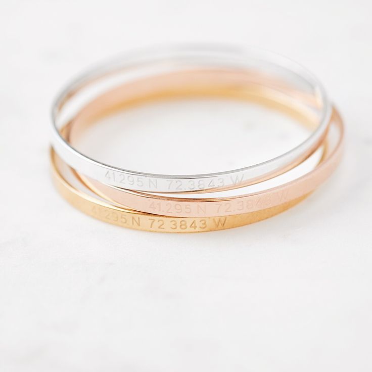 Classic Engraved Bangle Bracelets, Everyday Timeless Stackable Bangle, Elegant Adjustable Engraved Bangle, Elegant Engraved Adjustable Bangle, Adjustable 14k Gold Timeless Bangle, Elegant Personalized Sterling Silver Bracelet, Timeless 14k Gold Adjustable Bangle, Minimalist Tarnish Resistant Bracelets For Anniversary, Dainty Engraved Bangle Jewelry