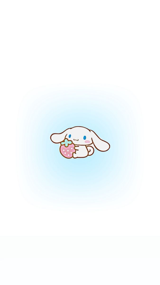 a white rabbit holding a pink object in its mouth