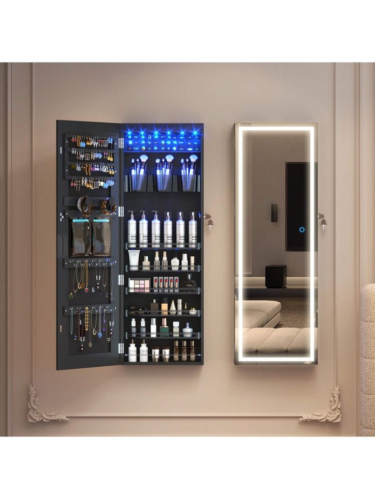 a bathroom with a lighted mirror and medicine cabinet