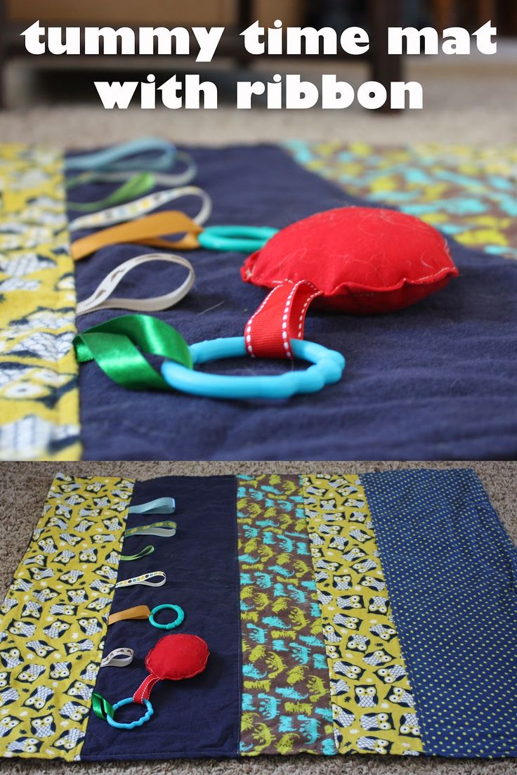 a table topped with lots of different items on top of a blue cloth covered floor