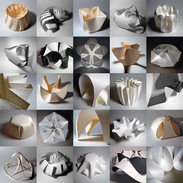 many different types of origami flowers on display