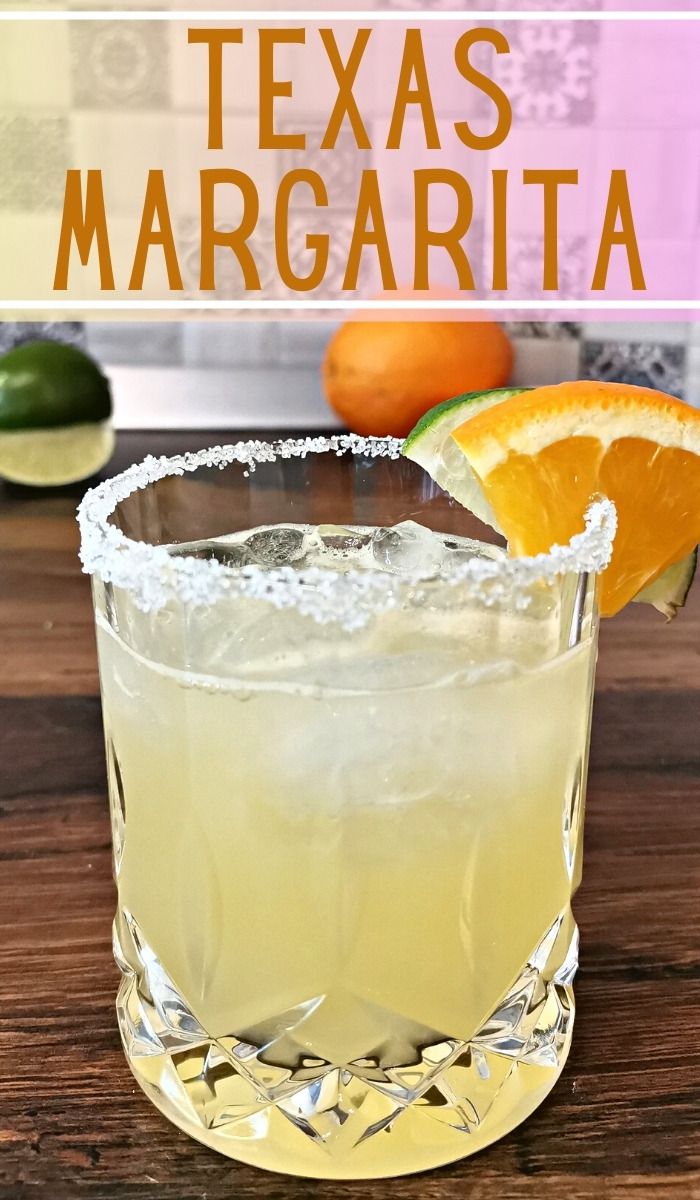 a margarita sitting on top of a wooden table