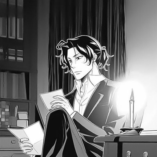 an anime character sitting in front of a desk with papers and a lamp on it