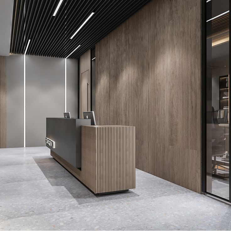 an office with wood paneling and glass doors on the walls, along with a reception desk