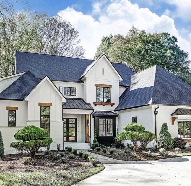 a large white house with lots of windows