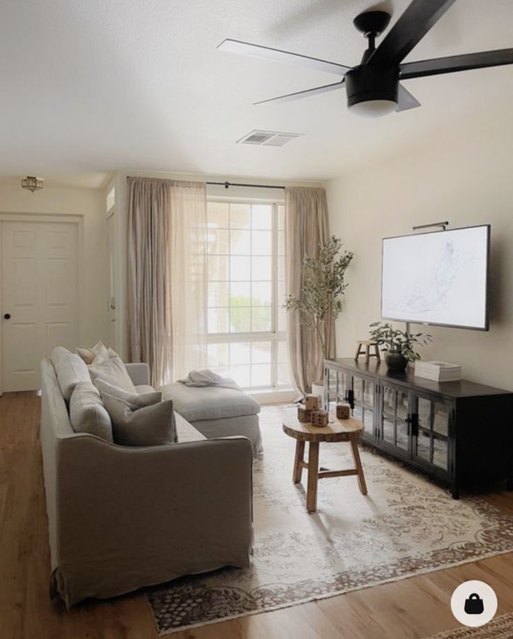 the living room is clean and ready for us to use in its new owner's home