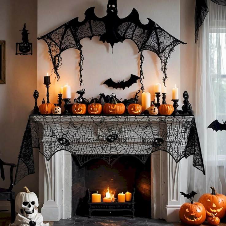 a fireplace decorated for halloween with candles and pumpkins