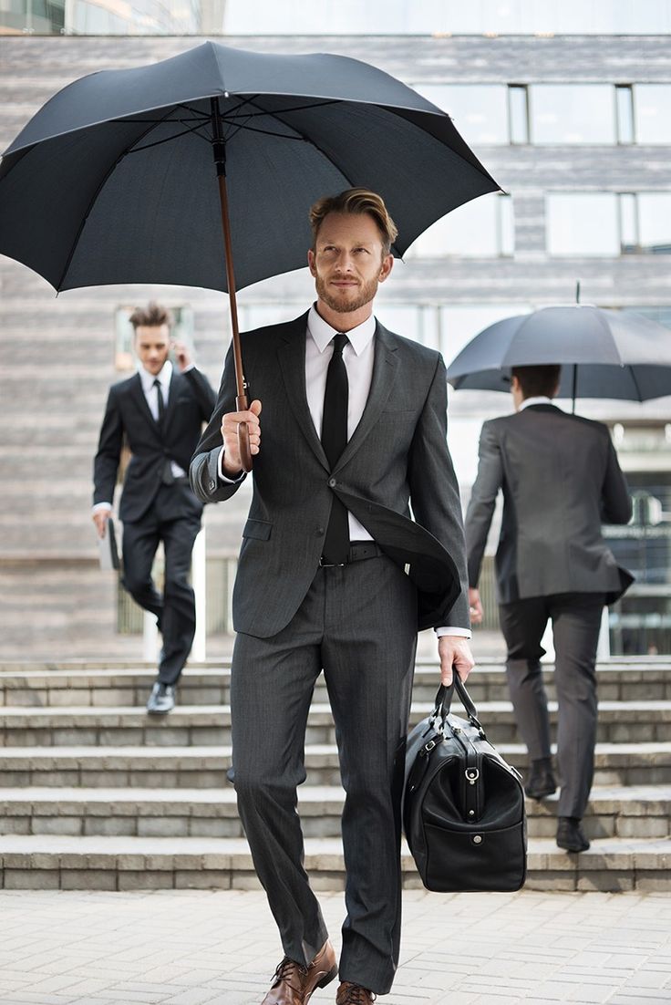 Businessman holding a large black umbrella Mens Umbrella, Holding Umbrella, Black Umbrella, Outfit Png, Under My Umbrella, Fashion For Men, Men Style Tips, Summer Outfits Men, Gentleman Style