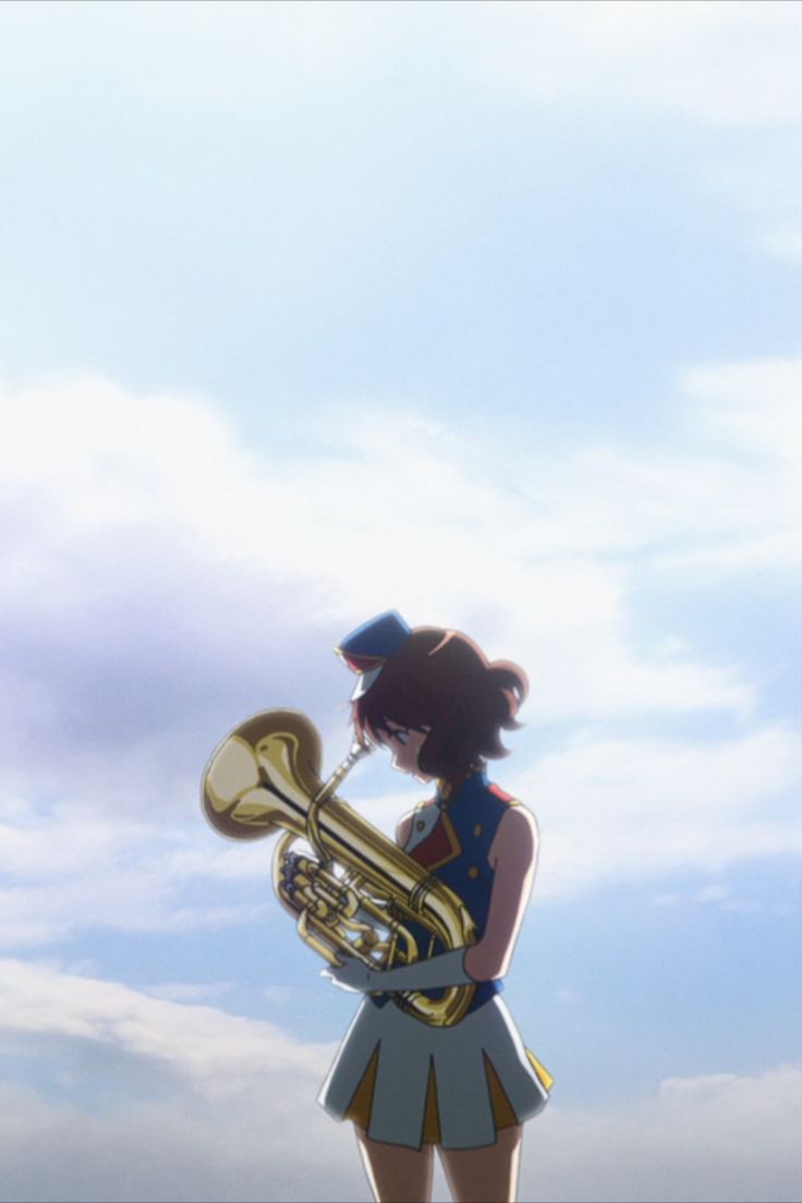 a girl with a trumpet in her hand is looking up into the sky while standing on top of a hill