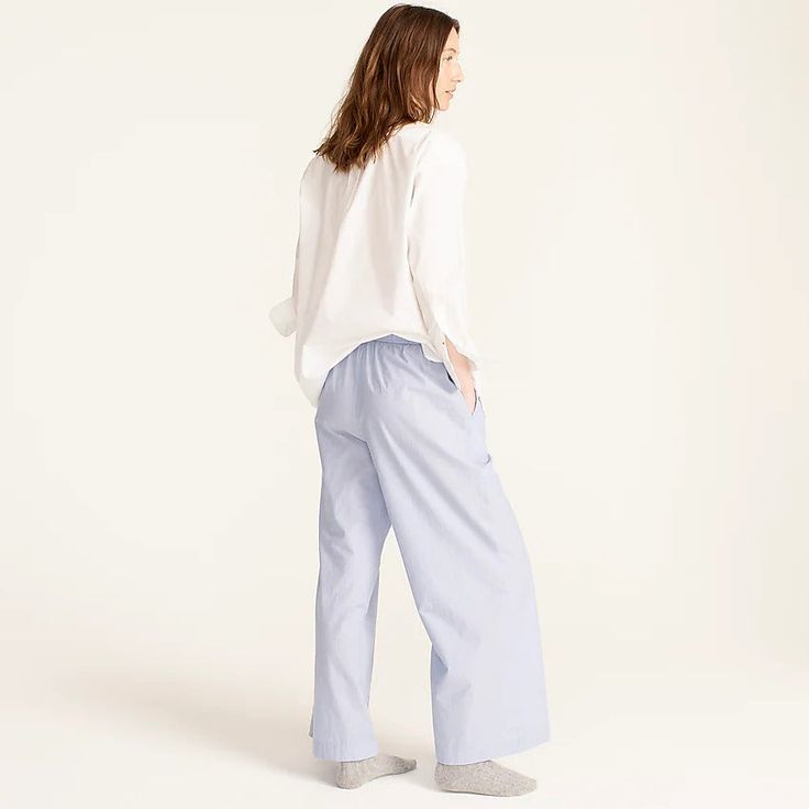 Cotton Wide-Leg Pajama Pant is the best-relaxed sleep pant featuring an elastic waistband. These pants will keep you comfortable and warm, anywhere. We are passionate about fabric and textile materials and have thus created the best, most comfortable yet practical line of pajamas. This loungewear is all you need to help relax at home. They are soft and easy to touch which projects versatility and effortless grace in every step you take. Made to make you feel good, each of our Original Pajamas is Wide Leg Cotton Sleepwear, Cotton Wide Leg Sleepwear For Relaxation, Wide Leg Cotton Sleepwear For Relaxation, Trousers Sleepwear With Pockets For Loungewear, Sleepwear Trousers With Pockets For Loungewear, Cotton Sleepwear With Elastic Waistband And Wide-leg Pants, Comfortable Sleepwear With Elastic Waistband, Comfortable Pants With Elastic Waistband For Pajama Party, Comfortable Elastic Waistband Pants For Pajama Party