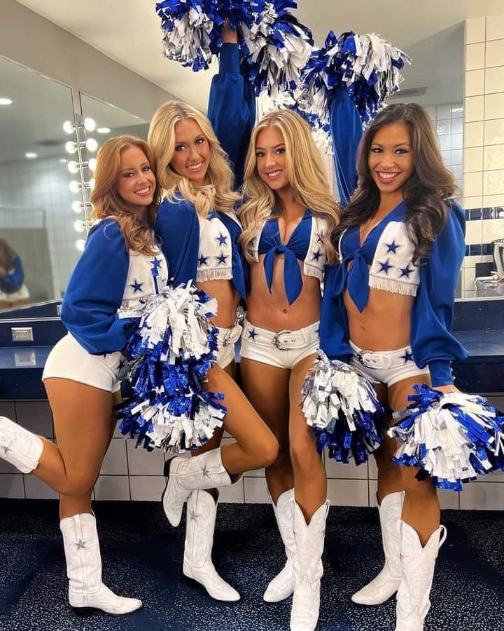 the cheerleaders are posing for a photo together