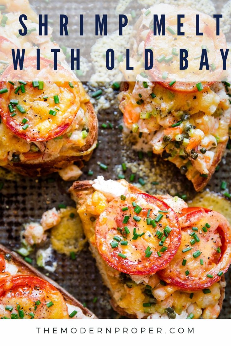 shrimp melts with old bay potatoes and tomatoes on a baking sheet, topped with parsley