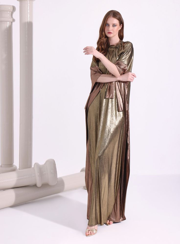 WF ATELIERMat Mat gold relax fit evening out kaftan Fabric: 100% Polyester The model wears size One size and is 177 cm tall. Garment length: 145 cm Gold Floor-length Kaftan For Festive Occasions, Gold Maxi Length Kaftan For Festive Occasions, Gold Maxi-length Kaftan For Festive Occasions, Festive Gold Maxi Length Kaftan, Festive Floor-length Gold Kaftan, Gold Floor-length Abaya, Festive Gold Floor-length Kaftan, Gold Maxi Length Abaya For Party, Gold Floor-length Party Abaya