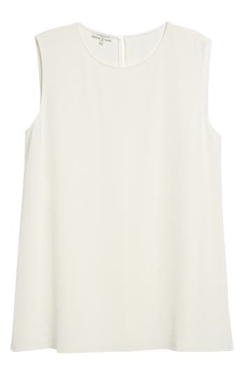 Whether worn as an underpinning or as a feature piece, this sleeveless blouse is all simple elegance in a straight cut from shape-retaining stretch silk. 28" length (size Medium) Back keyhole with button-and-loop closure Jewel neck Sleeveless Side slits 94% silk, 6% elastane Dry clean Imported Women's Designer Clothing Classic White Sleeveless Tank Top, Fitted Viscose Elegant Tank Top, Viscose Sleeveless Blouse Tank Top For Work, Sleeveless Viscose Tank Top For Work, Elegant Sleeveless Viscose Top, Elegant Sleeveless Viscose Blouse, Silk Sleeveless Tank Top For Work, Chic Silk Tank Top For Work, Chic Sleeveless Tank Top For Formal Occasions