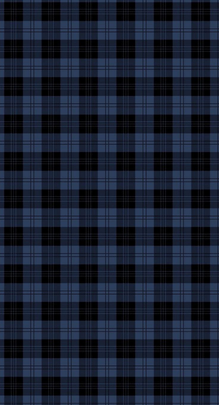 a black and blue plaid pattern that looks like it has been made into a wallpaper