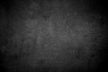 black grunge textured background with space for text or image