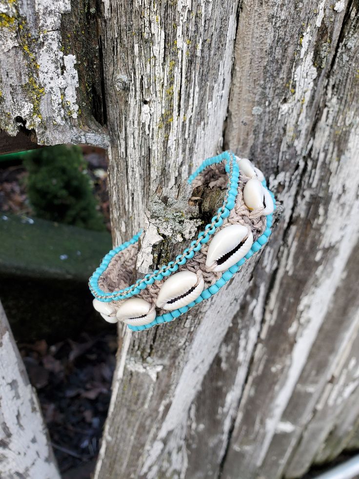 "Chunky Boho Cowrie Shell Beaded Bracelet Beach Wedding Jewelry Eclectic ethnic, tribal-inspired boho chic jewelry, crocheted, handcrafted in Queens, NY. *I made a few shell & hemp jewelry for an island photoshoot - see all the new posts soon! Right now I don't have shows and festivals, I have a little time to make these. A chunky crocheted and beaded hemp bracelet with a loop & knob closure. There are 11 shells & 87 beads on this! 1\" wide, 7\" long - custom size is available! Last 2 photos; Th Bohemian Macrame Jewelry For Crafting, Bohemian Woven Bracelets With Round Beads, Bohemian Turquoise Beaded Bracelets, Adjustable Crochet Jewelry For Festivals, Bohemian Macrame Bracelet, Handmade Cowrie Shell Bracelets For Festivals, Bohemian Cowrie Shell Bracelet Gift, Bohemian Cowrie Shell Gift Bracelet, Bohemian Bracelets With Round Beads For Beach