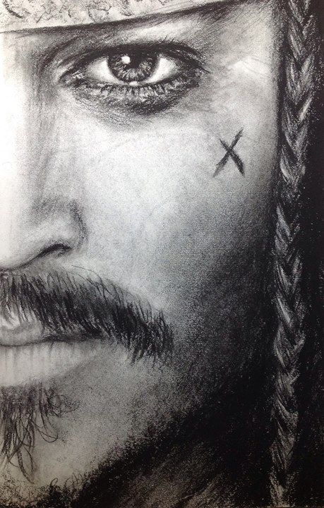 a pencil drawing of a man with a cross on his forehead