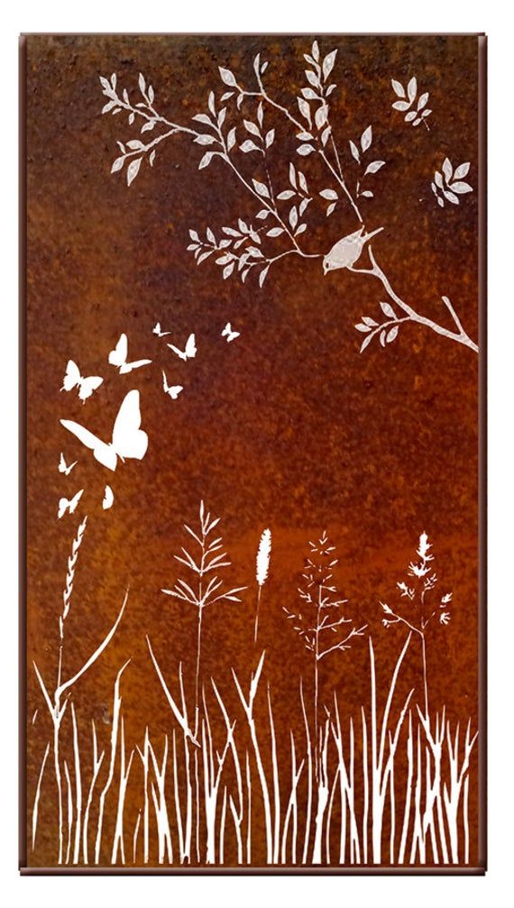 a metal wall hanging with butterflies flying over grass and flowers in the air, on an orange background