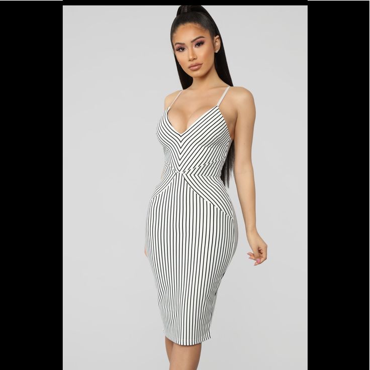 Ready For A Change Striped Midi Dress. White/Black Striped Midi Dress Adjustable Spaghetti Straps V Neck Back Zipper Closure Stretch Self: 95% Polyester 5% Spandex Lining: 100% Polyester White Spaghetti Strap Bodycon Dress For Date Night, Chic White Bodycon Dress With Spaghetti Straps, Chic White Spaghetti Strap Bodycon Dress, White Midi Dress With Spaghetti Straps For Night Out, White Bodycon Dress With Spaghetti Straps For Brunch, White Spaghetti Strap Bodycon Dress For Brunch, Striped Spaghetti Strap Party Dress, Midi Dress White, Striped Midi Dress