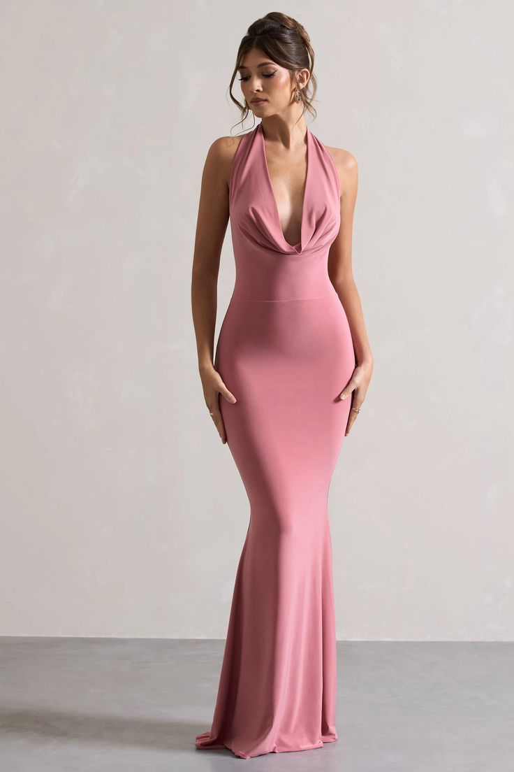 Step out in style in our beautifulMilanimaxi dress. Perfect for making an entrance, this pink maxi dress features a plunging cowl neck, scoop back design and curve contouring fishtail silhouette to highlight those curves in all the right places. Crafted in our premium jersey fabric,Milaniis the ultimate event dress that will never go out of style.  Features  - Premium stretch jersey - Plunge cowl neckline - Halter swanhook closure  - Fishtail skirt - Maxi length   Sizing & Fit  Model is 5'7 and wears UK size 8 / US size 4  Product Information     Double layered with good stretch  Premium jersey in Pink (95% Polyester, 5% Elastane)  157cm total length  SKU:CL128040008   Style Tips Tuck and drape the cowl neckline to achieve the desired look and use BOOMBA Magic Strips for all-day stay Pink Dress Wedding Guest, Achievement Board, Pink Wedding Guest Dress, Prom Things, Light Pink Maxi Dress, Wedding Fits, Fishtail Maxi Dress, Event Dress, Fishtail Skirt