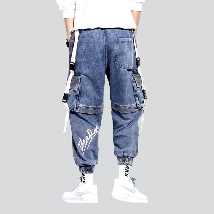 Make a bold statement with our 2023 Spring-Summer Collection's two-color men's denim pants. created with y2k-inspired. painted. baggy. high-waist. drawstrings closure and stretchy features. Ready to take your street style to the next level?Why It's Destined to Be Your New FavoriteThis one-of-a-kind denim pant is designed to make a statement. with a unique blend of y2k-inspired appeal. classic denim style. and modern details. Its striking two-color design. high waist. and baggy fit give it an und Strap Jeans, Denim Pants Mens, Painted Denim, Denim Style, Decorative Elements, Different Outfits, Colored Denim, Light Wash Denim, Denim Pant