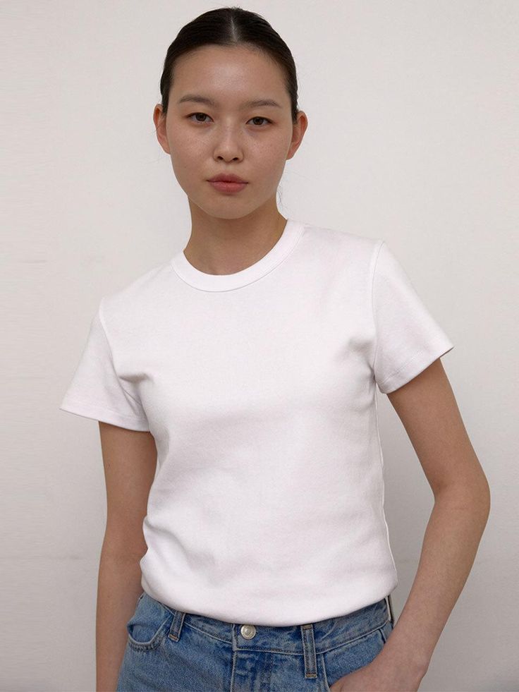 Composition : Cotton 95%, Span 5%Country of Origin : KOREA Basic White T-shirt For Everyday, Basic White Cotton Top, Classic White Stretch T-shirt, Simple White Stretch T-shirt, Classic Spring Crew Neck T-shirt, Basic White Crew Neck Tops, White Basic Crew Neck Top, White Short Sleeve Basic Tops, Fitted White Short Sleeve Top For Everyday