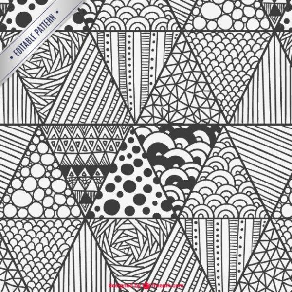 an adult coloring book with black and white designs on the cover, featuring abstract shapes