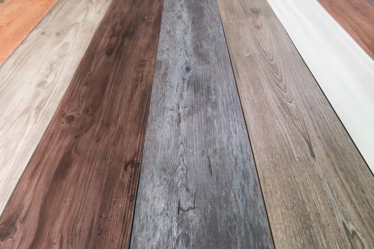 several different types of wood flooring laid out on top of each other in rows