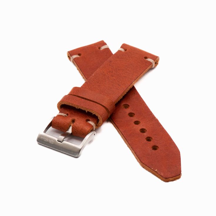 This handcrafted leather watch strap is the epitome of rugged luxury. Made by expert leather-crafters in the southeastern U.S., it is the perfect complement to any watch, forging the ideal union of form and function. As with any quality full grain leather product, your unique use of the strap will change its shape, color, and texture over time. You are not only buying a watch strap – you are embarking on a journey to create something unique and personal over the coming months and years.  
The full grain bovine leather comes from the renowned Horween Leather Company in Chicago. Honing their craft since 1905, Horween uses old world techniques coupled with proprietary processes and their own formula of natural oils and greases to create a work of unmatched durability and natural beauty.   
Tw Horween Leather, Leather Product, Leather Company, Leather Watch Strap, Handcrafted Leather, Watch Strap, Natural Oils, Full Grain Leather, Old World