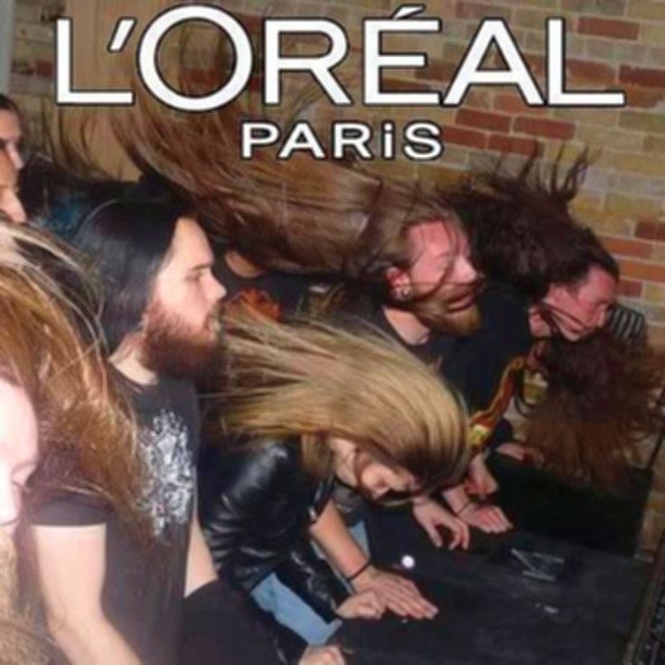 a group of people with long hair in front of a brick wall and text that reads l'oreal paris because metal is worth it