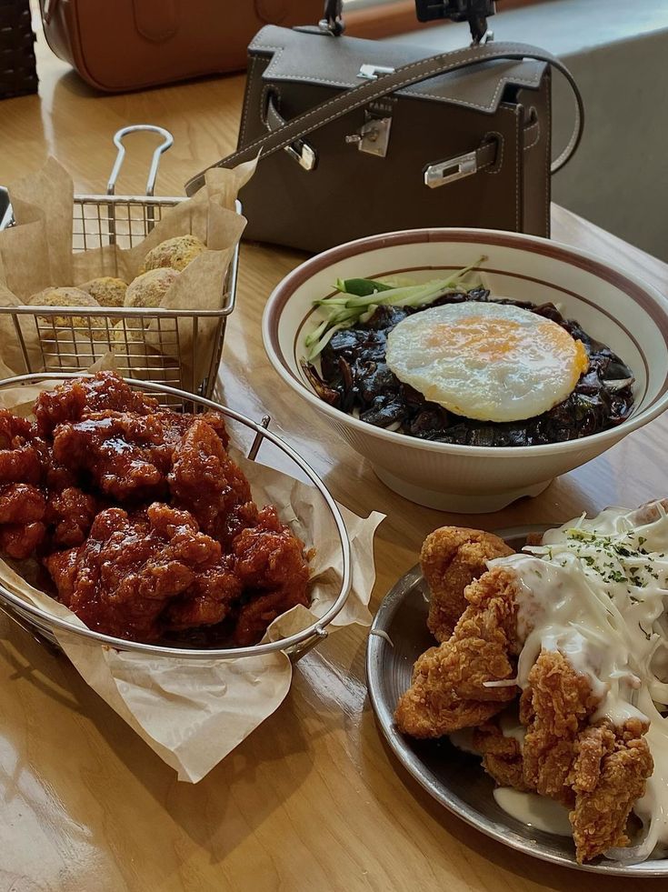 two baskets filled with food sitting on top of a wooden table