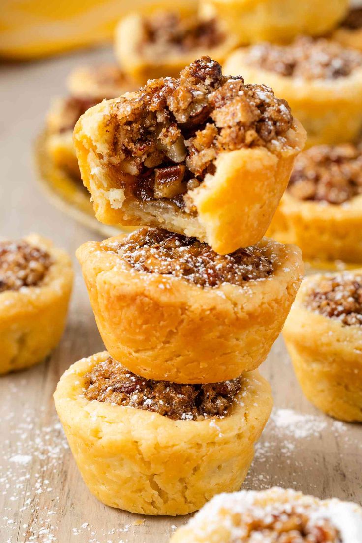 mini pecan pies stacked on top of each other