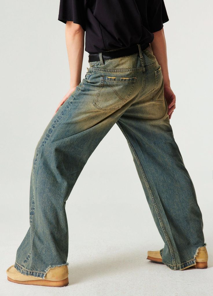 Retro-Inspired Wide Leg Denim Jeans - Embrace a nostalgic look with these wide and baggy fit jeans. Featuring a straight leg design, ripped back hemline, and distressing details, these 100% denim cotton jeans are unisex and perfect for any casual outfit. Available in wash blue, they include a unique SP leather patch on the back. Sizes: Extra Small, Small, Medium, Large, Extra Large SIZE (CM) LENGTH WAIST BUTT EXTRA SMALL 101 69 90 SMALL 104 75 96 MEDIUM 106 79 100 LARGE 108 83 104 EXTRA LARGE 11 Distressed Wide Leg Relaxed Fit Flare Jeans, Distressed Wide Leg Flare Jeans With Relaxed Fit, Baggy Dark Wash Flare Jeans With Frayed Hem, Relaxed Fit Faded Flare Jeans With Frayed Hem, Faded Relaxed Fit Flare Jeans With Frayed Hem, Distressed Wide Leg Jeans In Relaxed Fit, Faded Flare Jeans With Frayed Hem And Relaxed Fit, Cotton Relaxed Fit Distressed Flare Jeans, Faded Straight Leg Pants With Frayed Hem