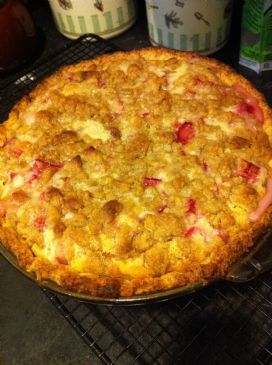 a pie sitting on top of a metal rack