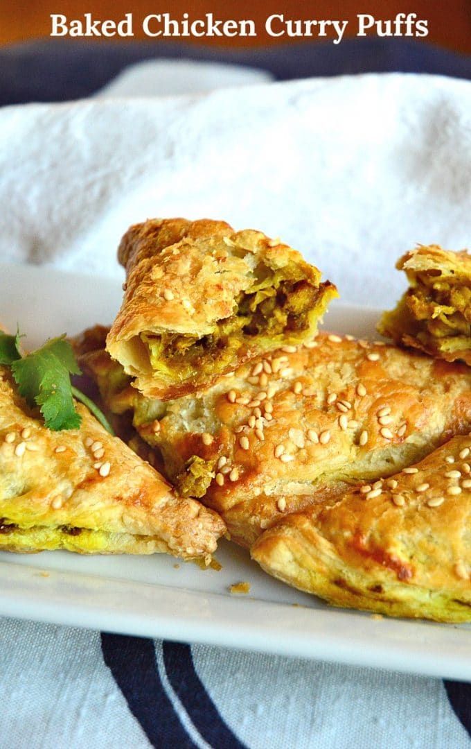 baked chicken curry puffs on a plate with text overlay that reads baked chicken curry puffs a dim sun fave