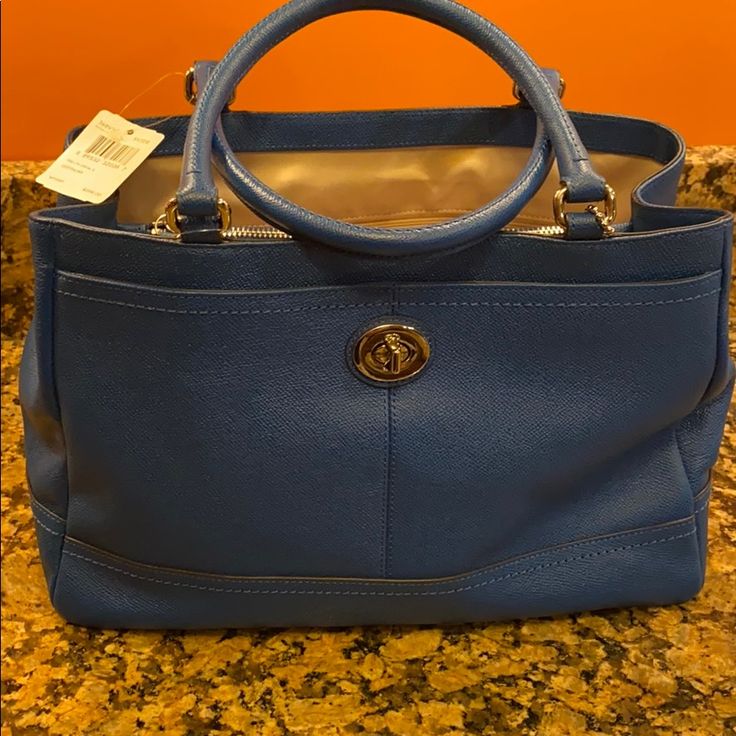 This Is A Fabulous Shade Of Blue Leather! Light Blue Top Handle Shoulder Bag With Gold-tone Hardware, Luxury Blue Bag For Everyday Use, Blue Top Handle Shoulder Bag, Light Blue Leather Bag With Top Carry Handle, Blue Tote Bag With Top Carry Handle, Blue Tote Bag With Detachable Handle, Blue Top Handle Bag For Office, Light Blue Double Handle Bag With Top Carry Handle, Blue Bags With Top Carry Handle For On-the-go