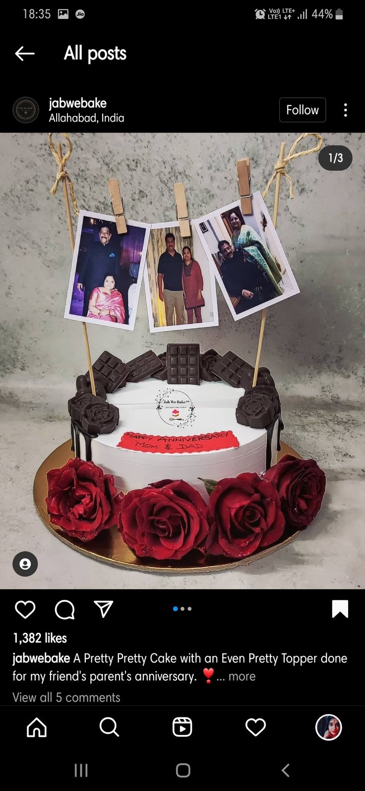 the cake is decorated with red roses and photos