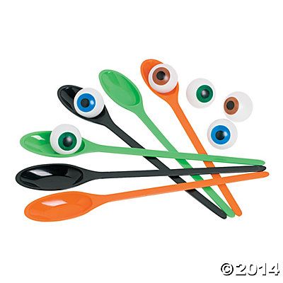 an assortment of spoons with different colored eyeballs on them, all in the same design